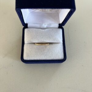 Delicate Gold Band with Sparkling Accents